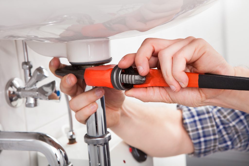 A man plumbing