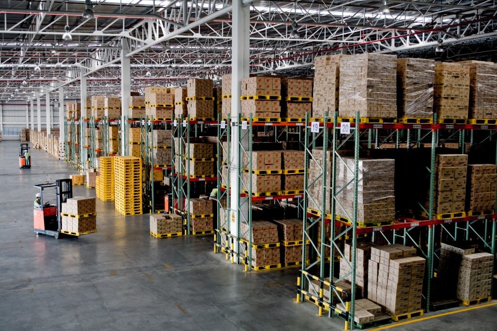warehouse workers inside big warehouse