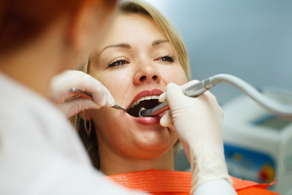 woman preparing for a dental surgery