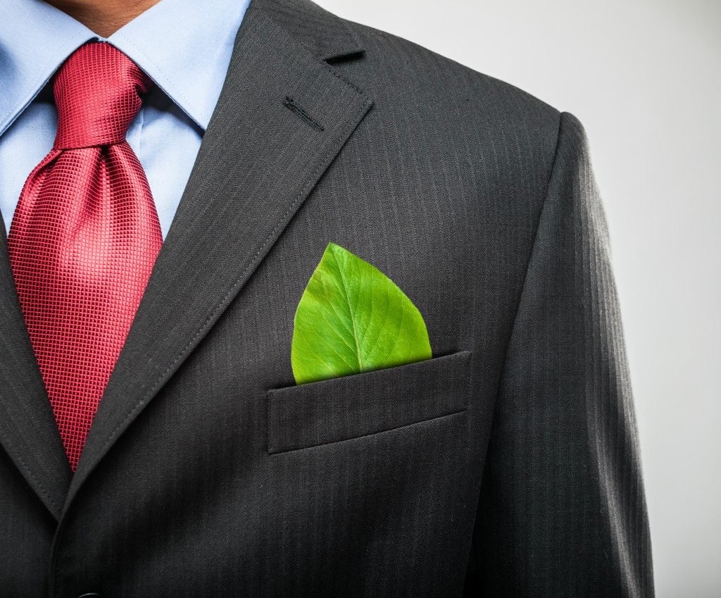 leaf on a businessman's suit pocket