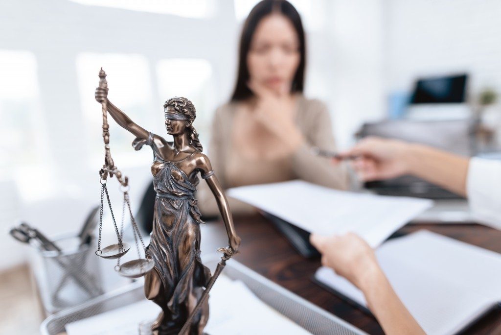 justice figurine in a law office