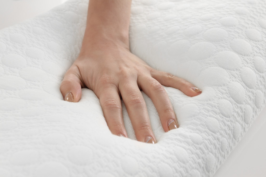 hand laid on to a a white foam or pillow