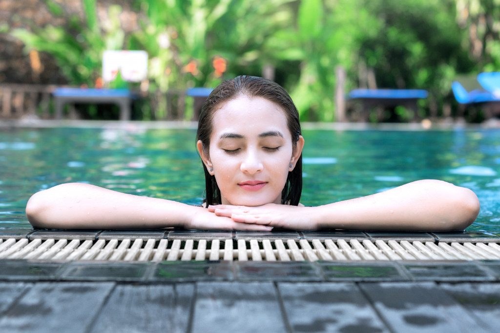 woman peaceful in the pool side