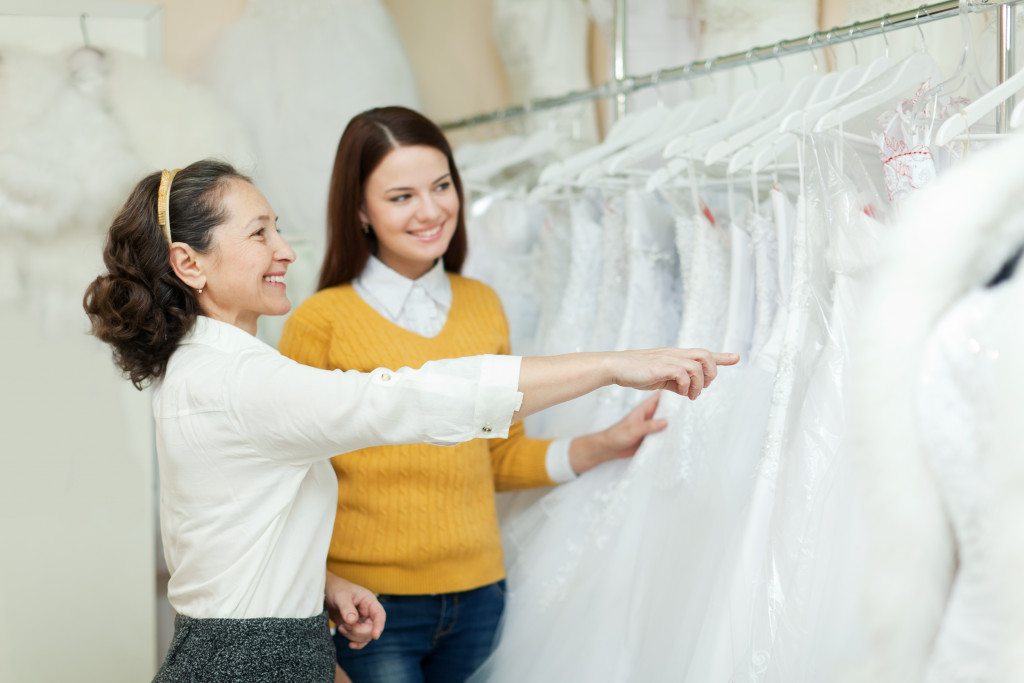 woman choosing wedding dress