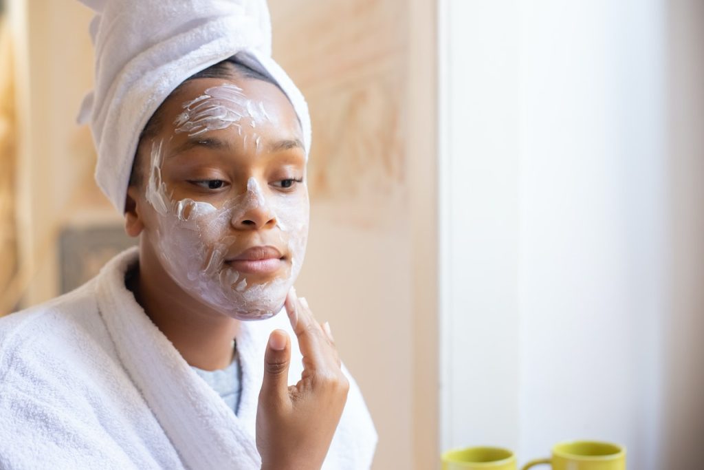 A Woman Applying Face Cream